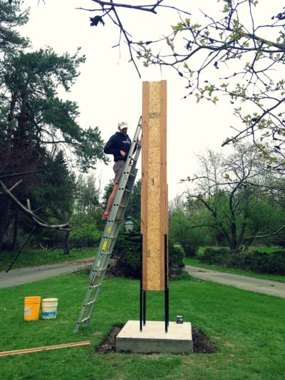 Volunteer Mike Dombroski helps to build a Chimney Swift tower at Capital City Bird Sanctuary.